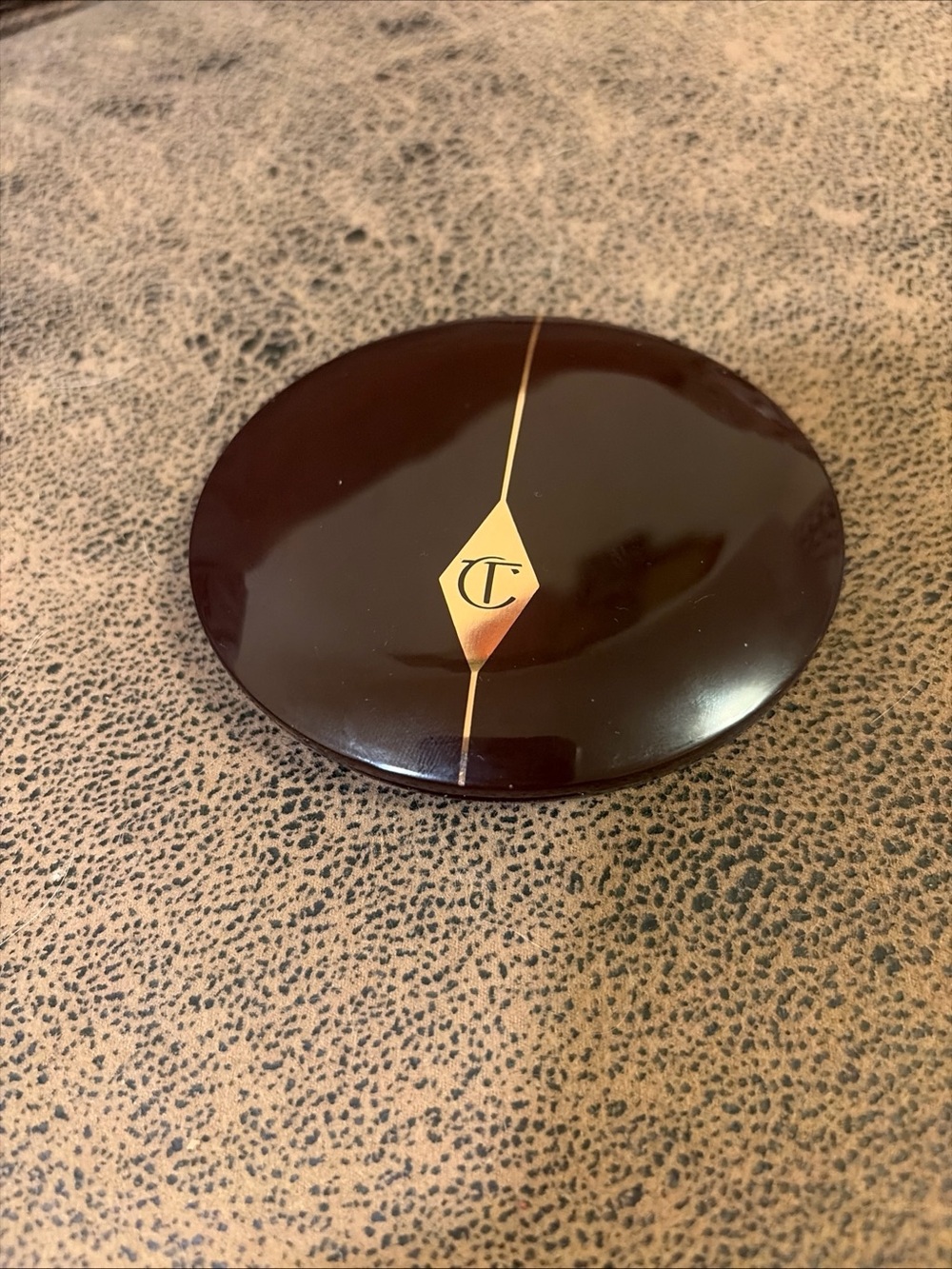Charlotte Tilbury Deep Brown Compact with Gold Accent
